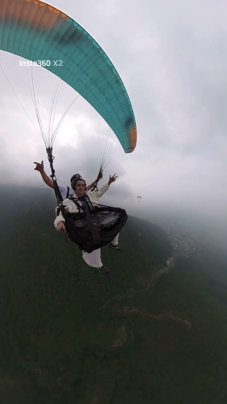 World’s First Paragliding DJ Drops Beats 10,000 Feet Above Himalayas!